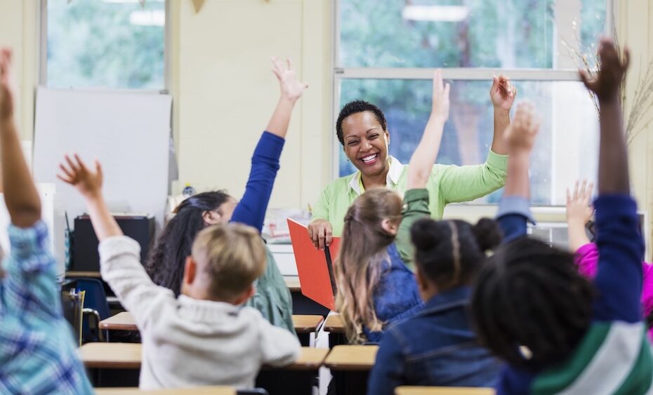 Kids raising hands
