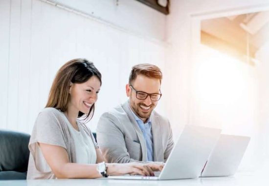 business-couple-working-together-project-modern-startup-office